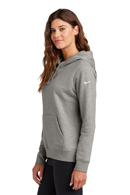 Woman wearing a gray Nike hoodie on a white background, Embroidered Nike Women's Club Fleece Sleeve Swoosh Hoodie