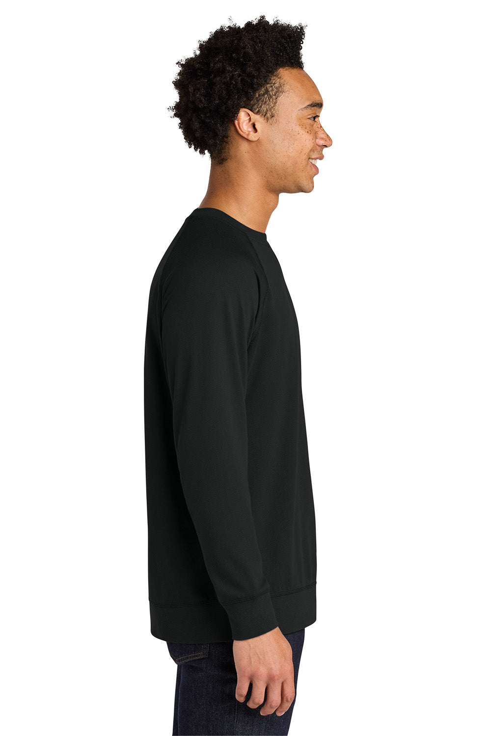 Person wearing a black long-sleeve shirt on a white background. Next Level Apparel® Laguna Raglan Sweatshirt, Embroidered