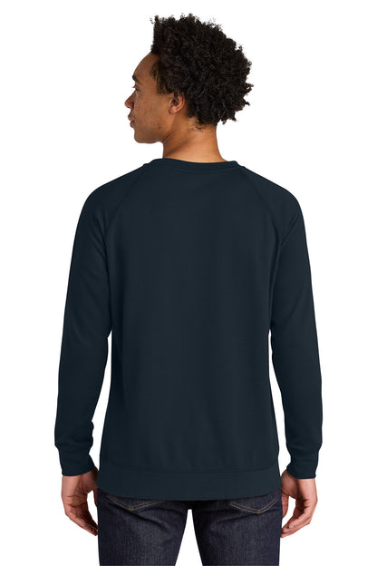 A man viewed from the back wearing a dark navy blue crewneck sweatshirt and dark jeans against a plain white background. Next Level Apparel® Laguna Raglan Sweatshirt, Embroidered