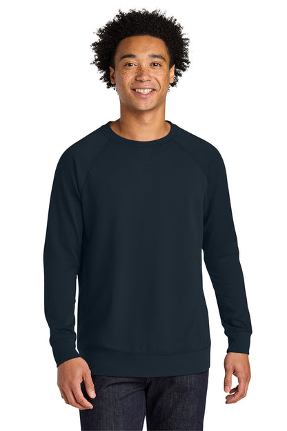 Man wearing a navy blue sweatshirt on a white background. Next Level Apparel® Laguna Raglan Sweatshirt, Embroidered