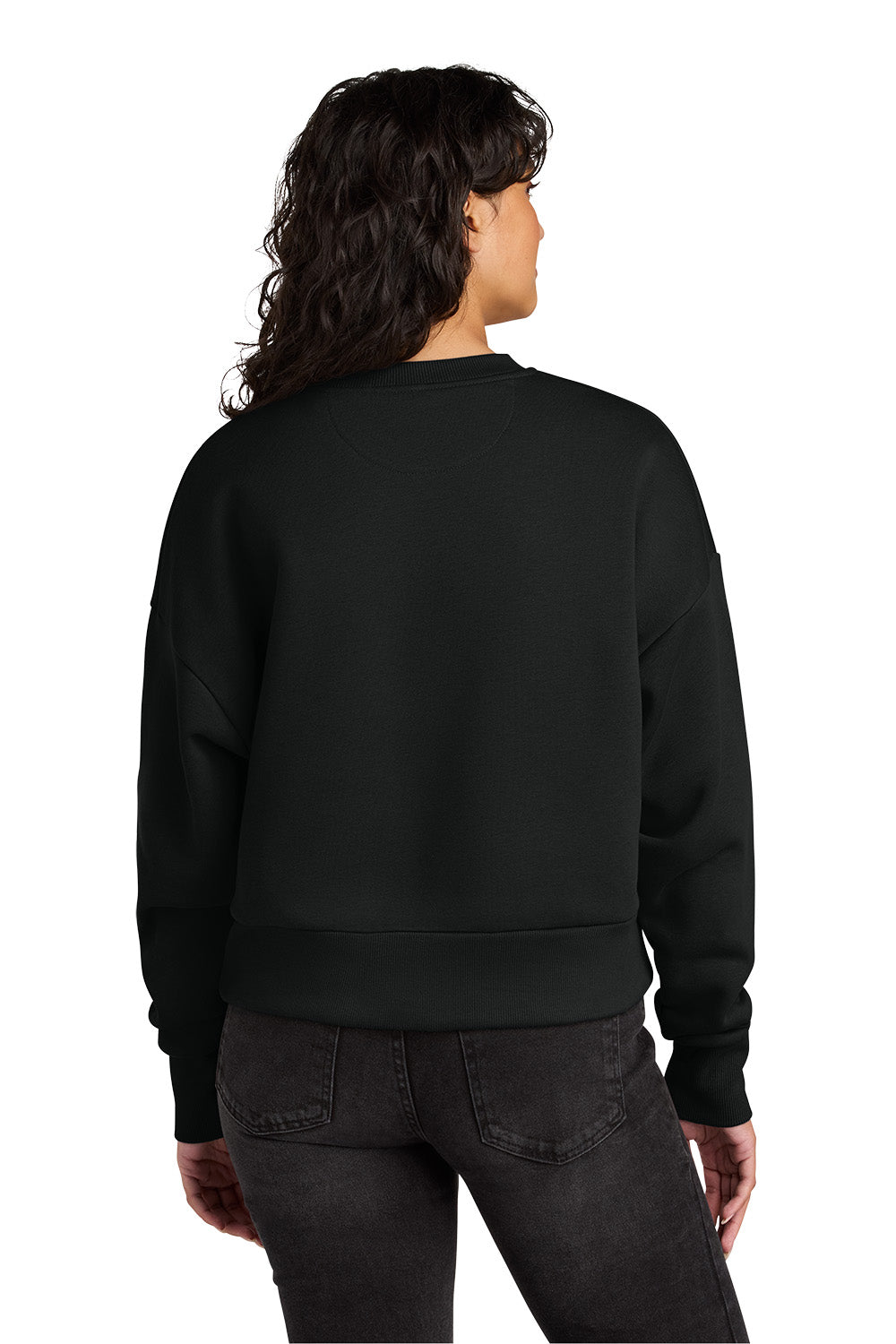Person wearing a black sweatshirt on a white background. Next Level Apparel® Women’s Heavyweight Sweatshirt, Embroidered