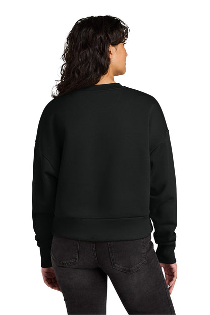 Person wearing a black sweatshirt on a white background. Next Level Apparel® Women’s Heavyweight Sweatshirt, Embroidered