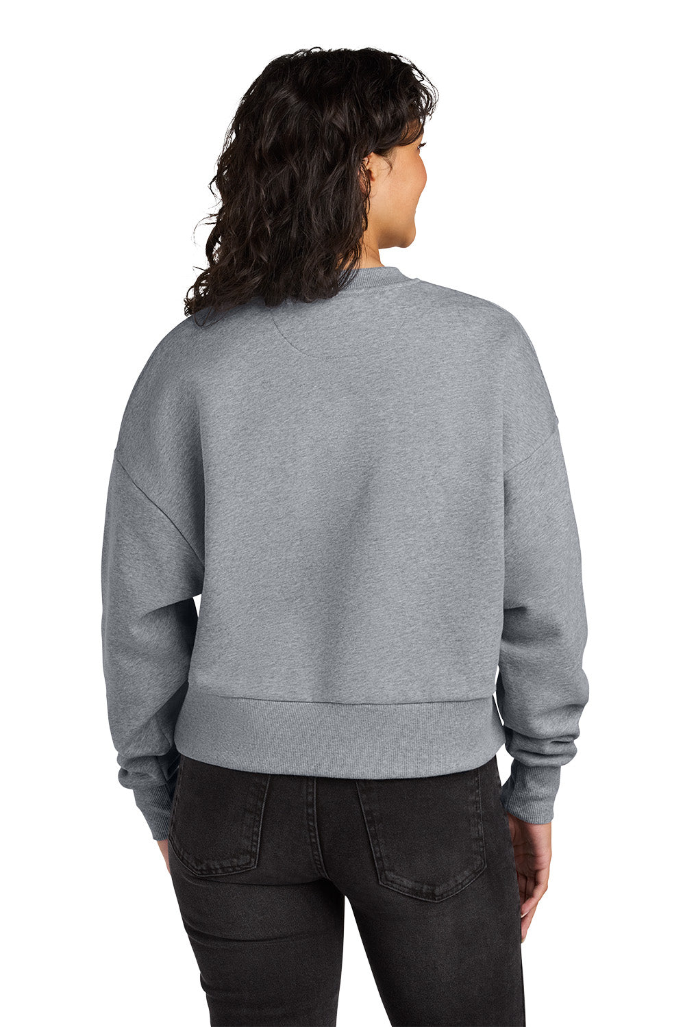 Person wearing a gray sweatshirt from behind on a white background. Next Level Apparel® Women’s Heavyweight Sweatshirt, Embroidered