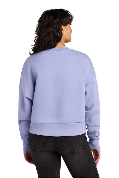 Person wearing a light purple sweatshirt from behind on a white background. Next Level Apparel® Women’s Heavyweight Sweatshirt, Embroidered