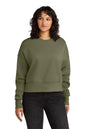 Woman wearing an olive green sweatshirt on a white background. Next Level Apparel® Women’s Heavyweight Sweatshirt, Embroidered