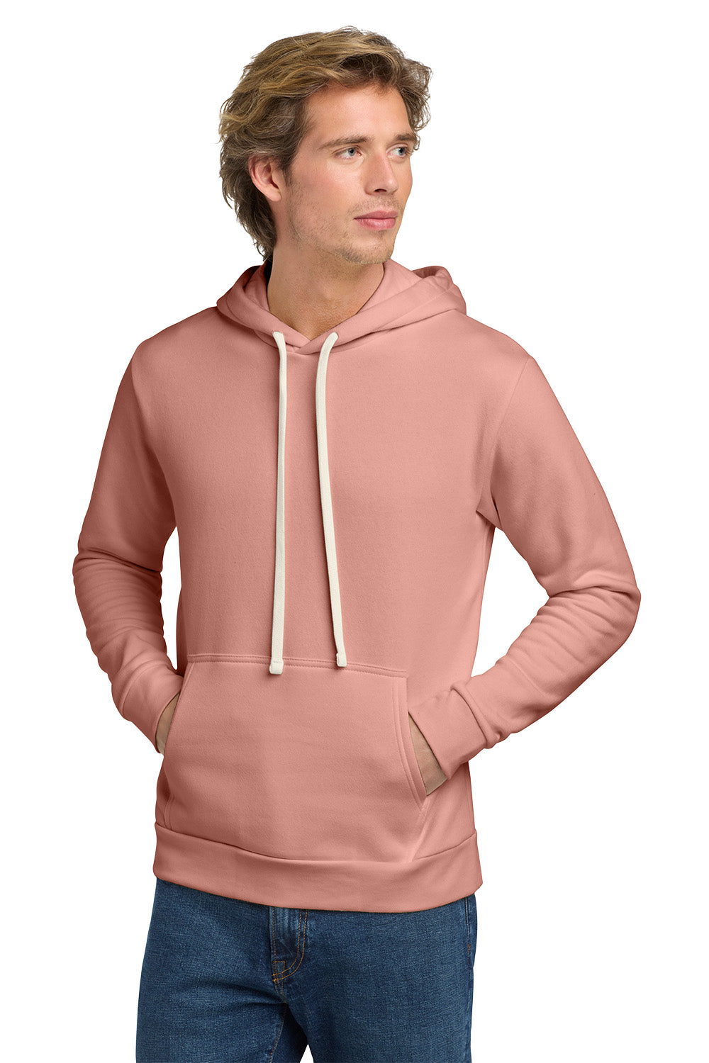 Man wearing a pink hoodie and blue jeans on a white background. v
