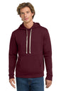 Man wearing a maroon hoodie on a white background. Next Level Apparel® Adult Santa Barbara Pullover Hoodie, Embroidered