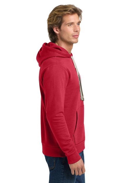 Man wearing a red hoodie on a white background. Next Level Apparel® Adult Santa Barbara Pullover Hoodie, Embroidered