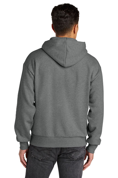 A man viewed from the back wearing a dark gray pullover hoodie and dark gray jeans against a plain white background. Next Level Apparel® Heavyweight Hoodie, Embroidered
