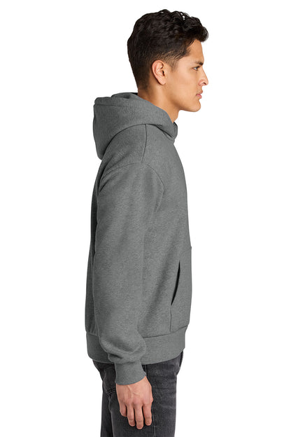 Person wearing a gray hoodie on a white background. Next Level Apparel® Heavyweight Hoodie, Embroidered