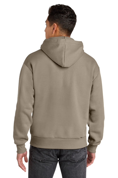 Person wearing a beige hoodie from behind on a white background. Next Level Apparel® Heavyweight Hoodie, Embroidered