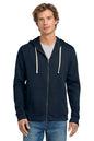 Man wearing a navy blue hoodie with a white zipper on a white background. Next Level Apparel® Adult Santa Barbara Zip Hoodie, Embroidered