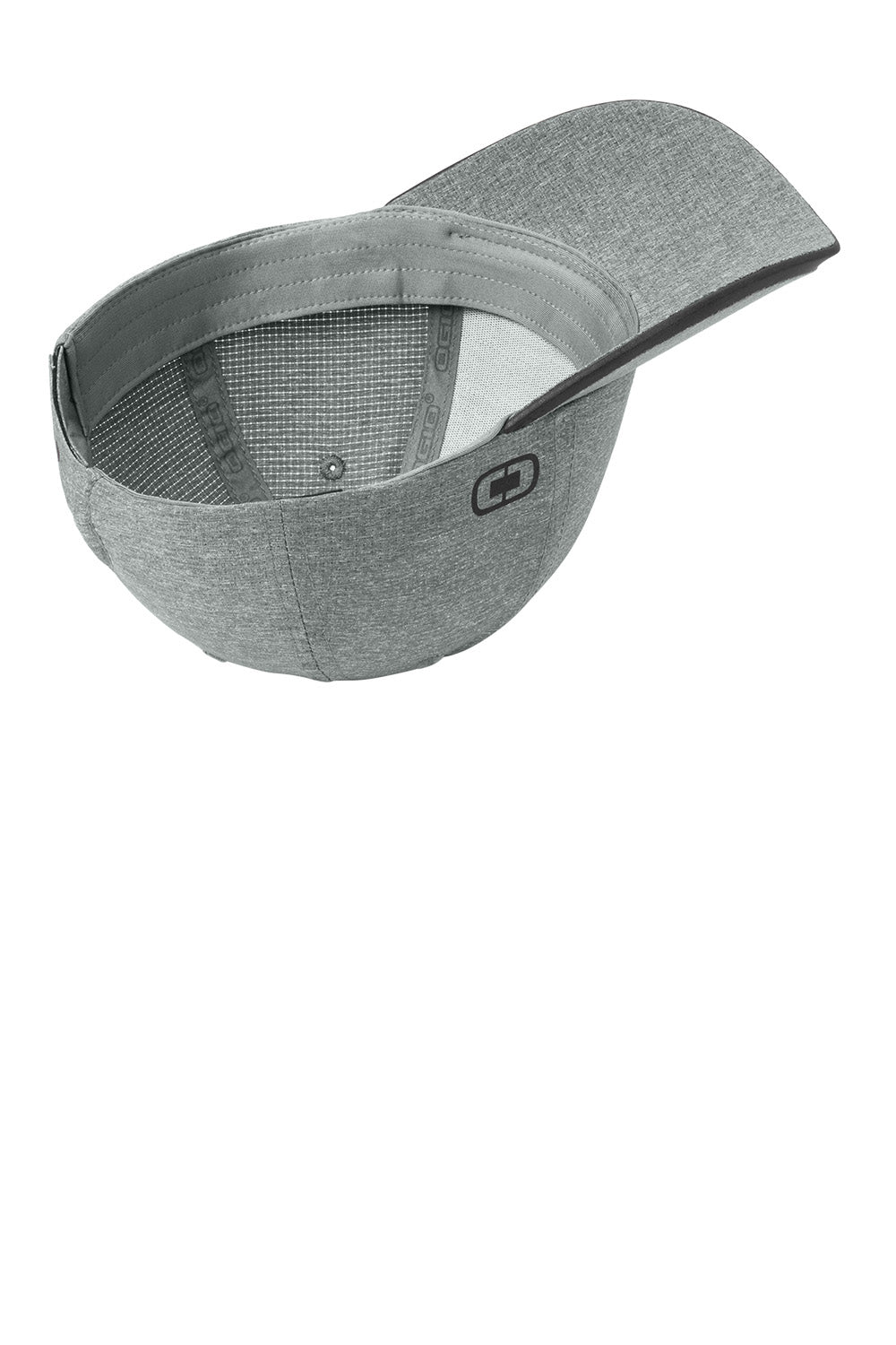 A heather gray baseball cap shown from an angled top-down view, displaying the curved brim, mesh back, and a small black logo patch on the side. OGIO® Flux Cap, Embroidered