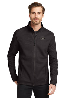 Man wearing a black jacket with 'Your Logo Here' text on a white background embroidered OGIO® Grit Fleece Jacket