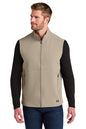 Man wearing a beige vest over a black long-sleeve shirt on a white background, Embroidered OGIO® Kinetic Soft Shell Vest