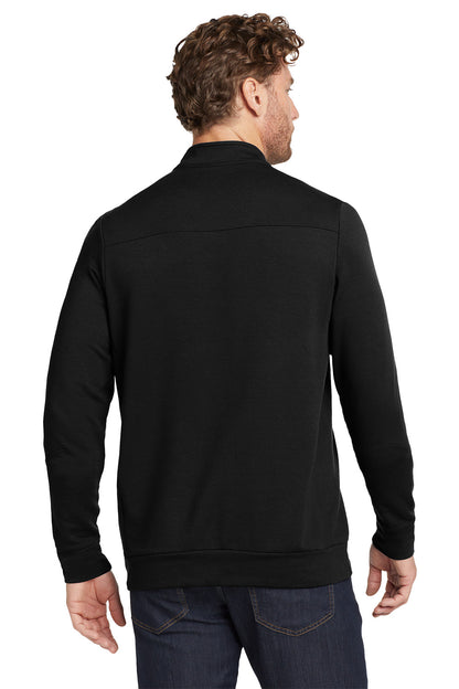 Man wearing a black jacket on a white background, embroidered OGIO® Luuma 1/2-Zip Fleece