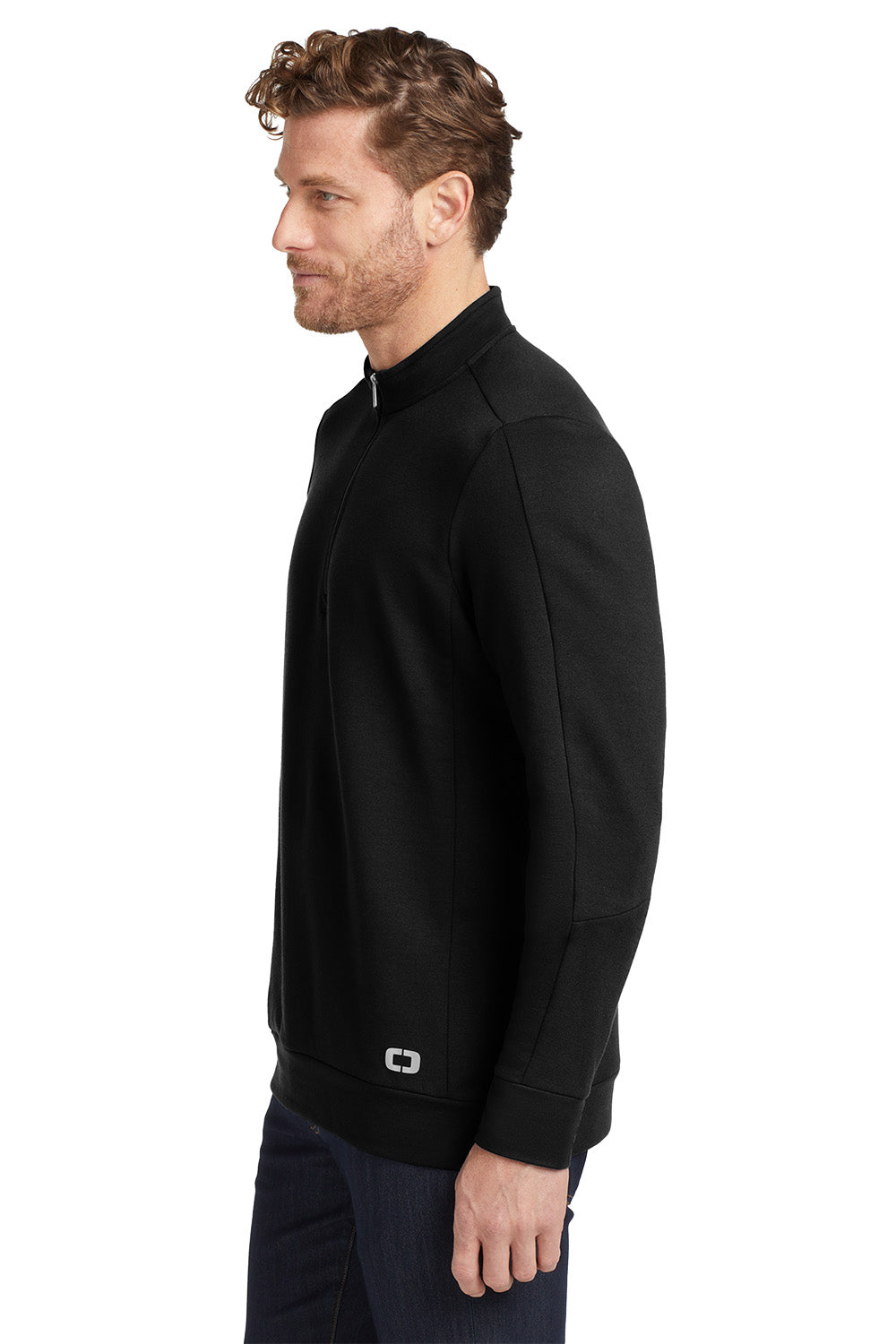 Man wearing a black quarter-zip sweatshirt on a white background, embroidered OGIO® Luuma 1/2-Zip Fleece