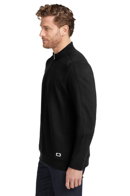 Man wearing a black quarter-zip sweatshirt on a white background, embroidered OGIO® Luuma 1/2-Zip Fleece