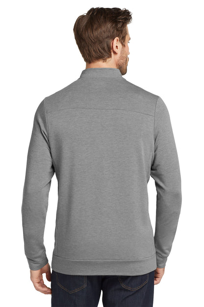 Man wearing a gray zip-up sweatshirt on a white background, embroidered OGIO® Luuma 1/2-Zip Fleece