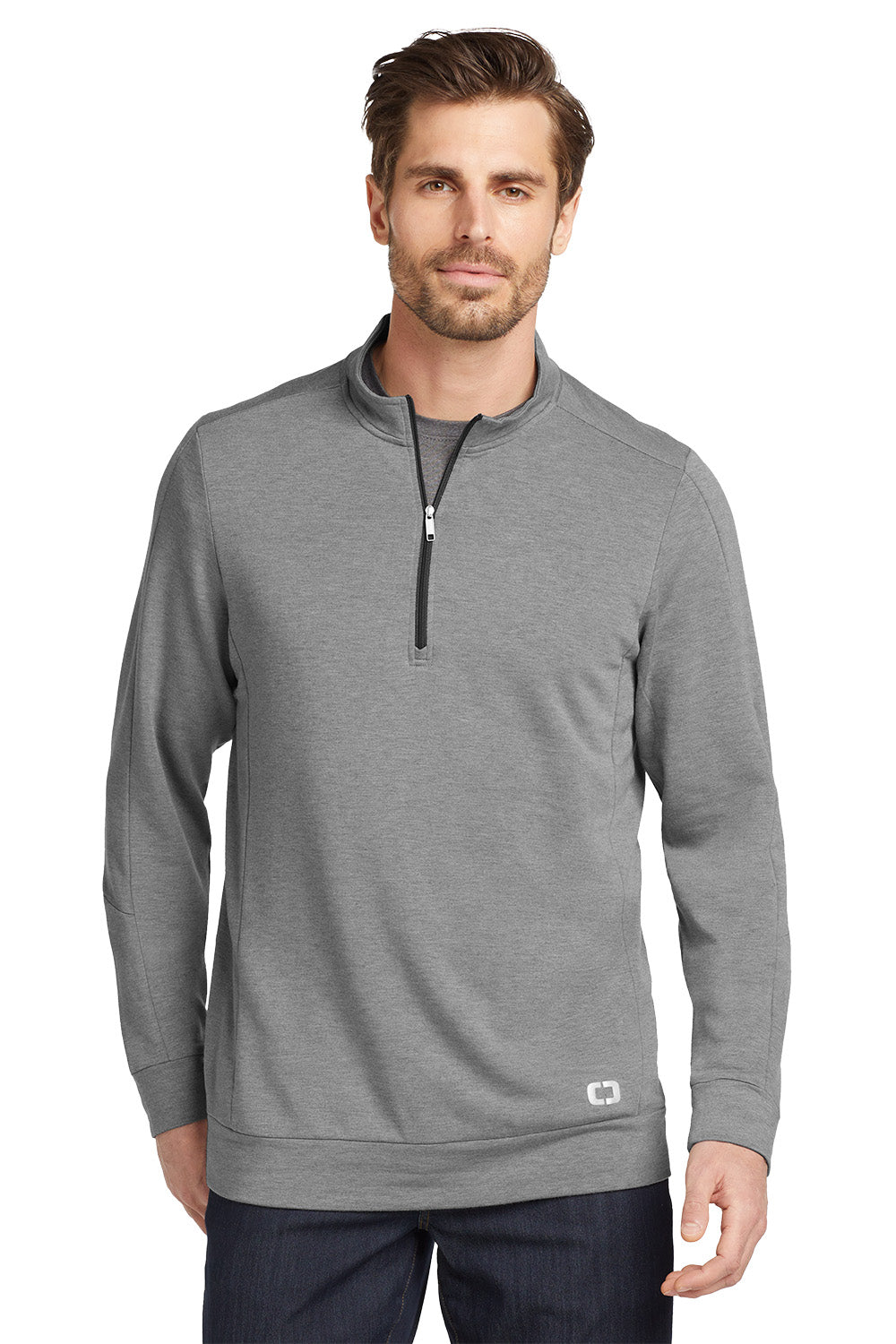 Man wearing a gray pullover with a quarter zip on a white background, embroidered OGIO® Luuma 1/2-Zip Fleece