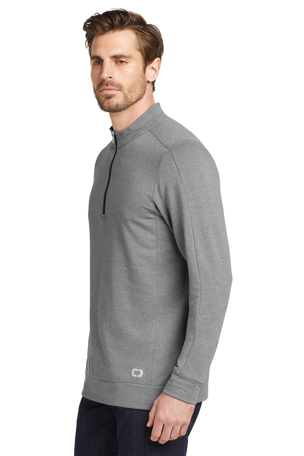Man wearing a gray long-sleeve shirt on a white background, embroidered OGIO® Luuma 1/2-Zip Fleece