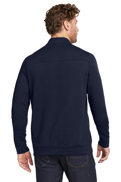 Man wearing a navy blue jacket on a white background, embroidered OGIO® Luuma 1/2-Zip Fleece