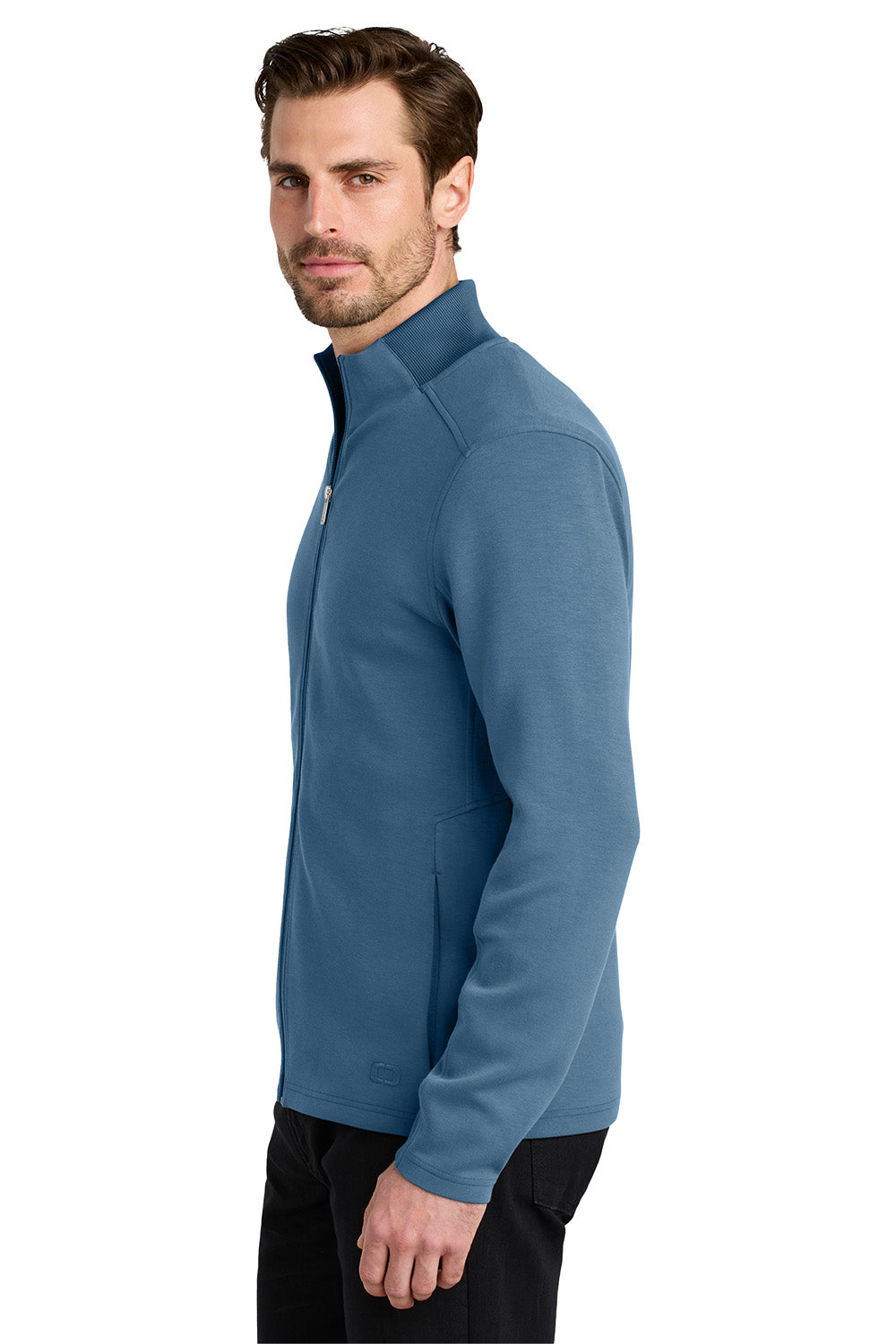 Man wearing a blue fleece jacket on a white background OGIO® Transcend Full-Zip, Embroidered