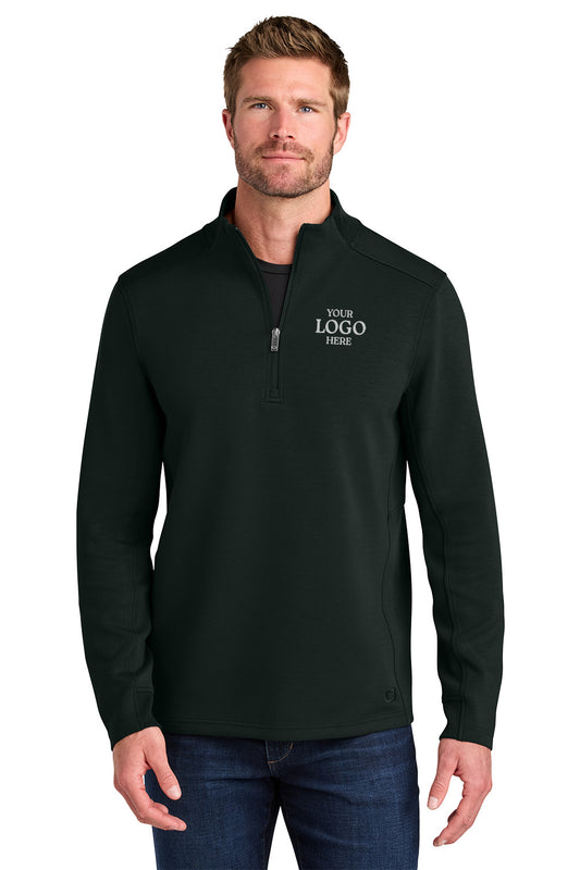 Man wearing a black quarter-zip pullover with customizable logo text on a white background OGIO® Transcend 1/4-Zip, Embroidered