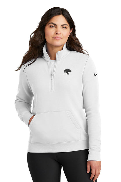 Woman wearing a white quarter-zip sweatshirt with a Nike logo on a white background. Nike Women's Club Fleece Sleeve Swoosh 1/2-Zip, Comstock Park by Helmsman Stitch Co