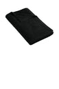 Folded black blanket on a white background. Port Authority® Cabana Beach Towel, Embroidered by Helmsman Stitch Co.