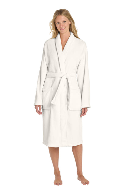 A woman modeling a white bathrobe against a plain white background. Port Authority® Plush Microfleece Shawl Collar Robe, Embroidered