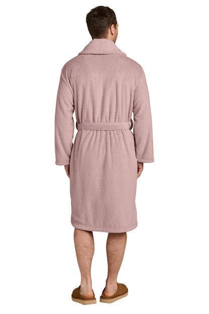 A man viewed from behind wearing a dusty pink bathrobe and brown slippers against a plain white background.  Port Authority® Dream Plush Robe, Embroidered