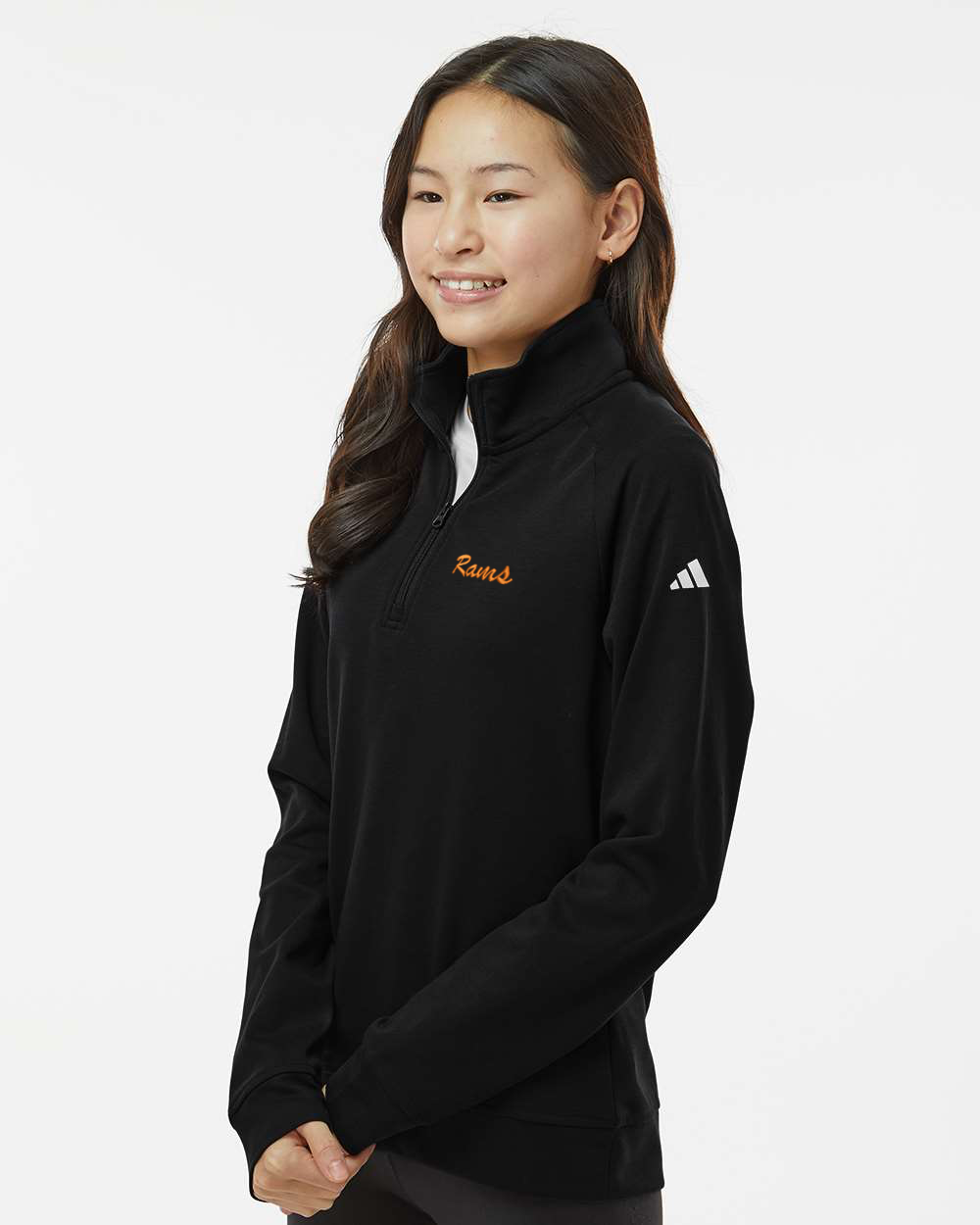 Person wearing a black Adidas sweatshirt on a white background. Adidas Youth Performance Quarter-Zip Pullover, RAM Logo embroidered by Helmsman Stitch Co.