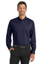 Man wearing a navy button-up shirt and black pants on a white background Port Authority® SuperPro™ Twill Shirt, Embroidered