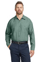 Man wearing a green shirt and navy pants on a white background embroidered Red Kap® Long Sleeve Industrial Work Shirt