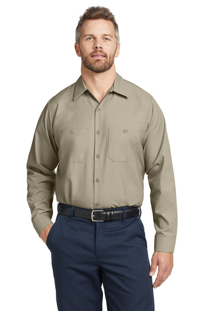 Man wearing a beige shirt and navy pants on a white background embroidered Red Kap® Long Sleeve Industrial Work Shirt