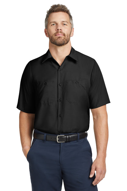 Man wearing a black short-sleeve shirt and navy pants on a white background embroidered Red Kap® Short Sleeve Industrial Work Shirt