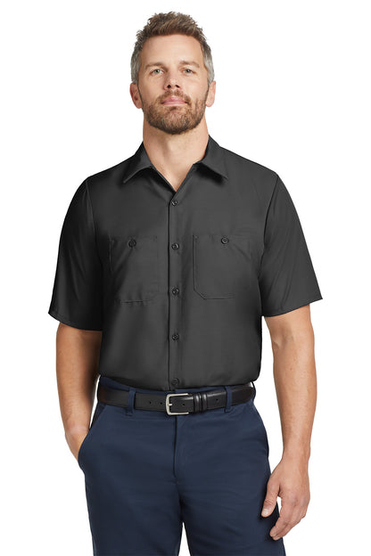 Man wearing a black short-sleeve shirt and navy pants on a white background embroidered Red Kap® Short Sleeve Industrial Work Shirt