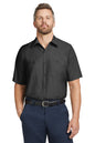 Man wearing a black short-sleeve shirt and navy pants on a white background embroidered Red Kap® Short Sleeve Industrial Work Shirt
