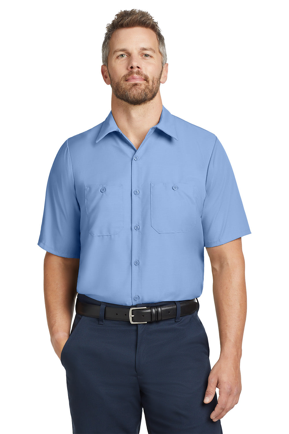 Man wearing a light blue short-sleeve shirt and navy pants on a white background embroidered Red Kap® Short Sleeve Industrial Work Shirt