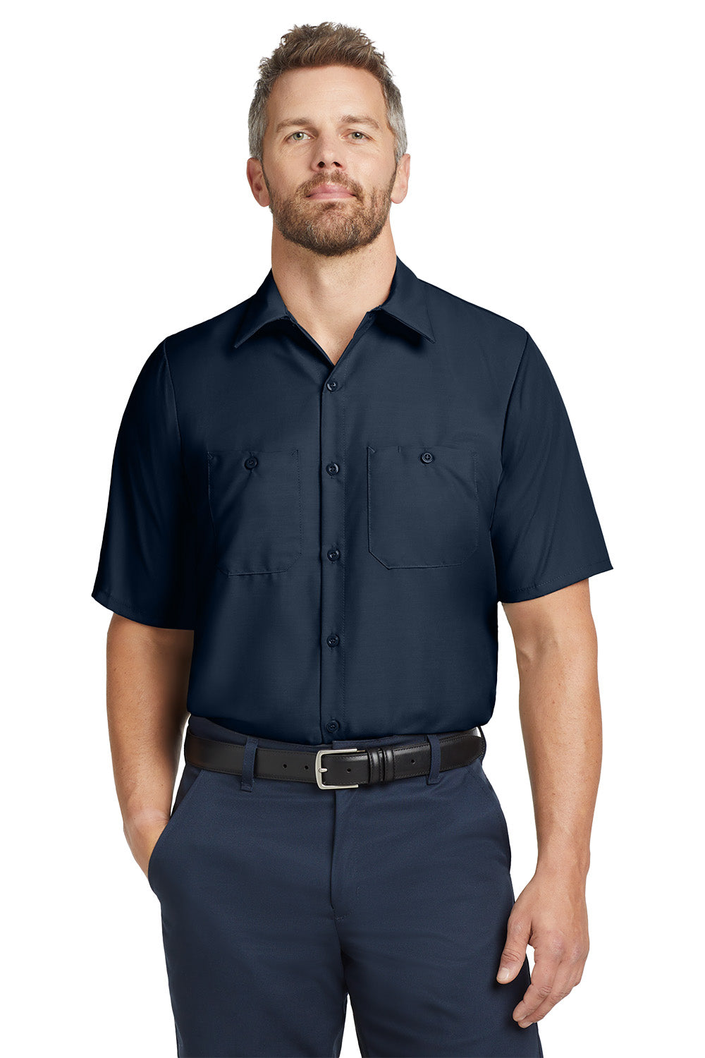 Man wearing a navy blue short-sleeve shirt and pants on a white background embroidered Red Kap® Short Sleeve Industrial Work Shirt