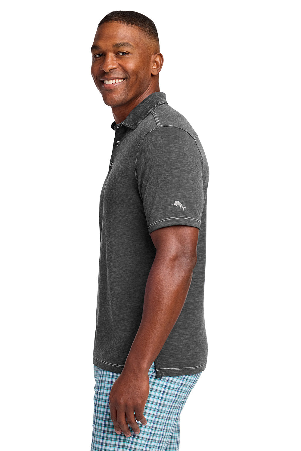 Man wearing a gray polo shirt with a visible brand logo on a white background, Tommy Bahama® Palmetto Paradise Polo, Embroidered