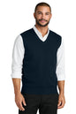 Man wearing a navy sweater vest over a white shirt on a white background. Port Authority® Easy Care Sweater Vest, Embroidered