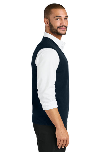 Man wearing a navy vest over a white shirt on a white background. Port Authority® Easy Care Sweater Vest, Embroidered