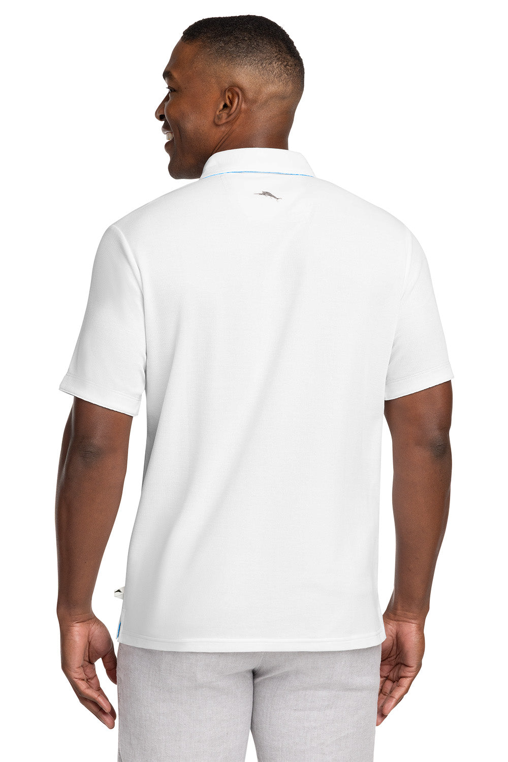 Man wearing a white polo shirt on a white background Tommy Bahama® 5 O’Clock Polo, Embroidered