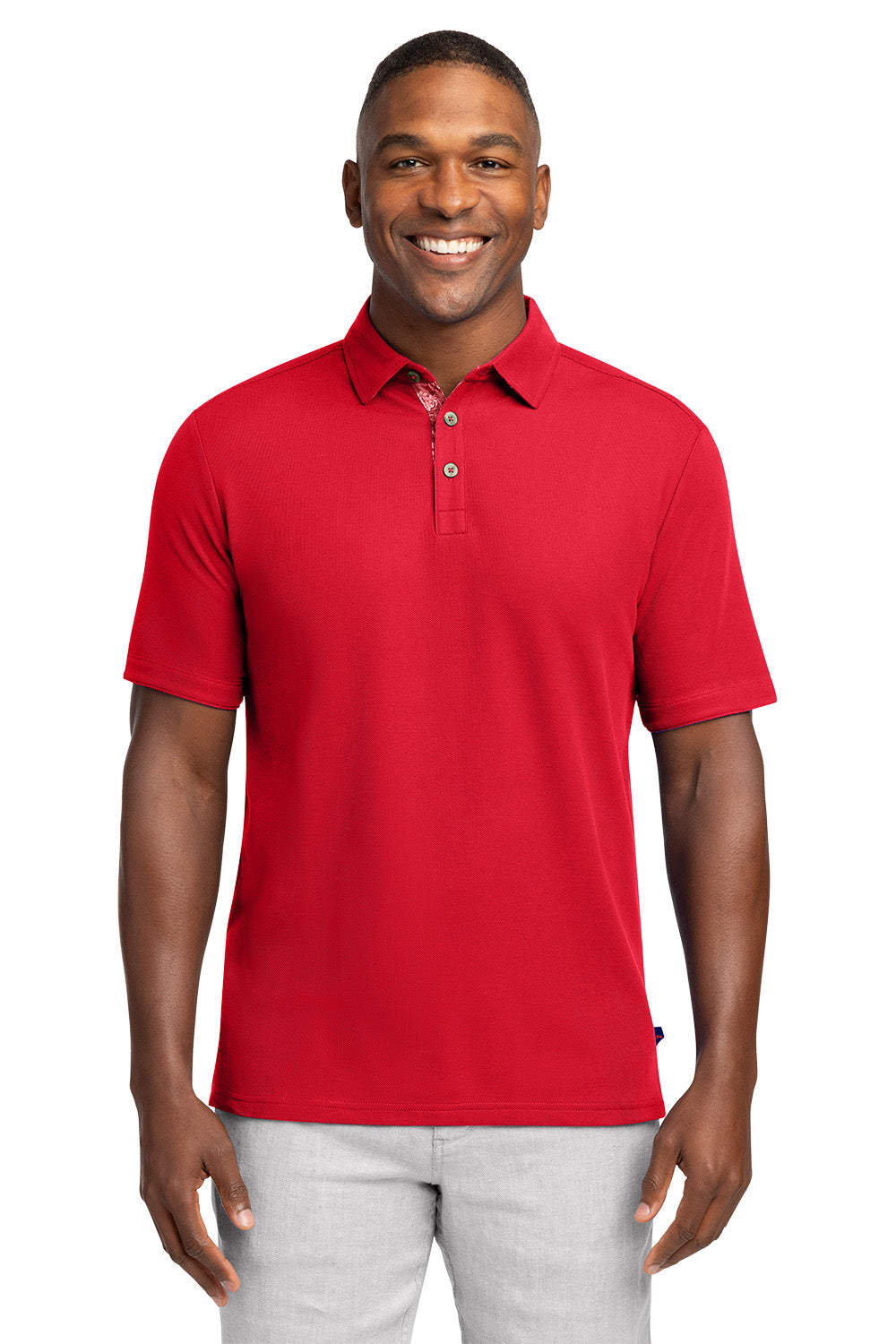 Man wearing a red polo shirt on a white background Tommy Bahama® 5 O’Clock Polo, Embroidered
