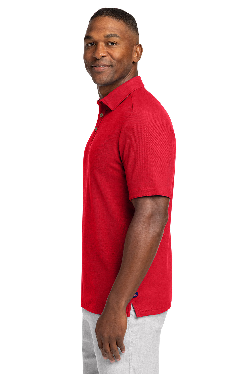 Man wearing a red polo shirt on a white background Tommy Bahama® 5 O’Clock Polo, Embroidered