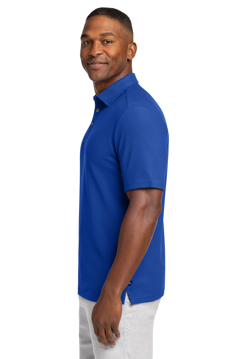 Man wearing a blue polo shirt on a white background Tommy Bahama® 5 O’Clock Polo, Embroidered