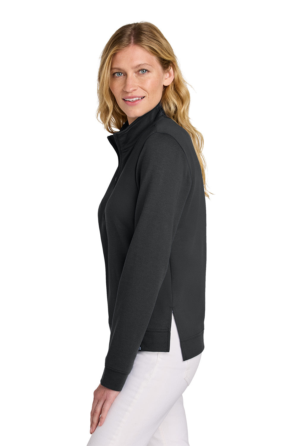 Woman wearing a black long-sleeve top with a zipper on a white background TravisMathew Women's Coveside 1/2-Zip, Embroidered