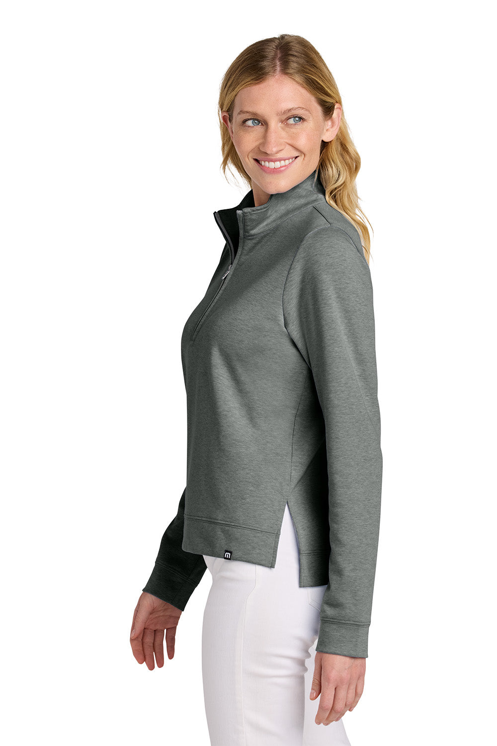 Woman wearing a gray zip-up jacket on a white background TravisMathew Women's Coveside 1/2-Zip, Embroidered